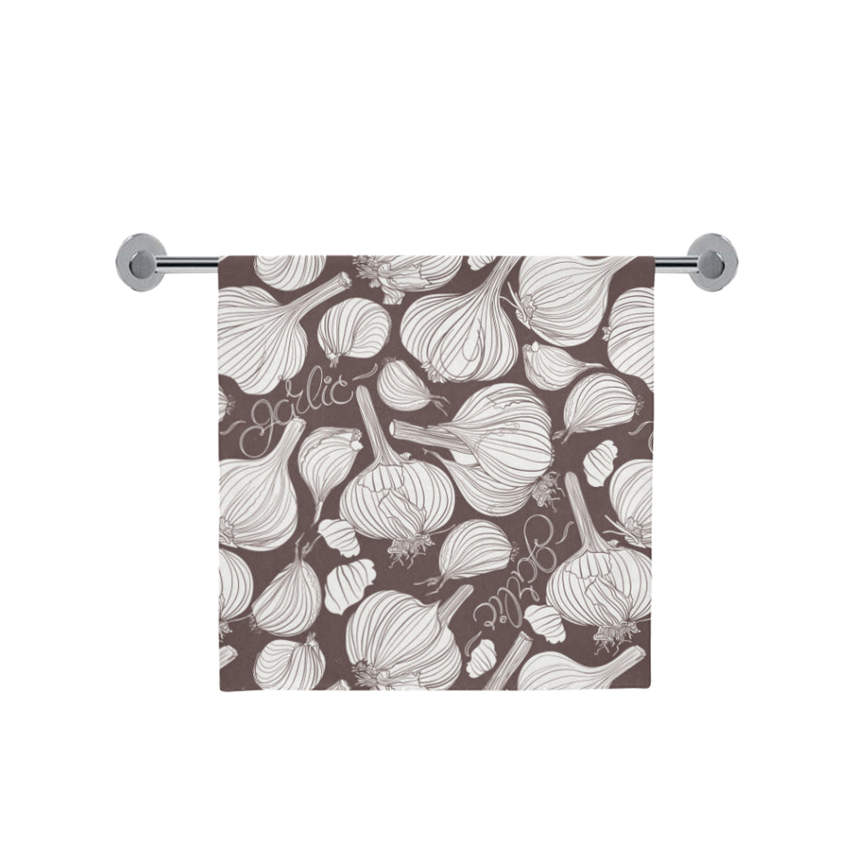 Garlic bulb dark background Bath Towel