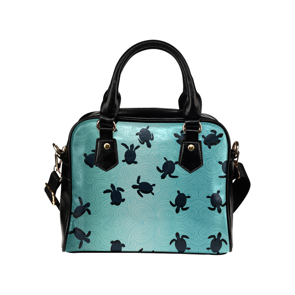 Sea turtle with blue ocean backgroud Shoulder Handbag