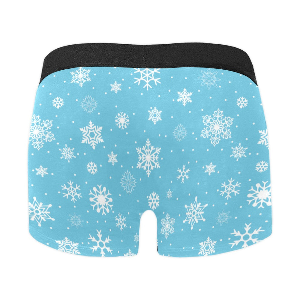 Snowflake pattern blue background Men's All Over Print Boxer Briefs Men's Underwear