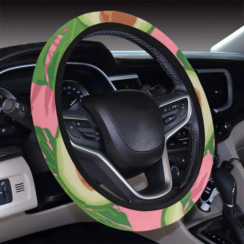 Avocado slices leaves pink back ground Car Steering Wheel Cover