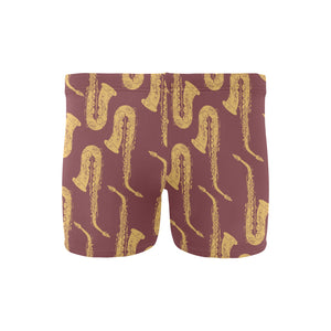 Hand drawn gold saxophone red background Men's Swimming Trunks