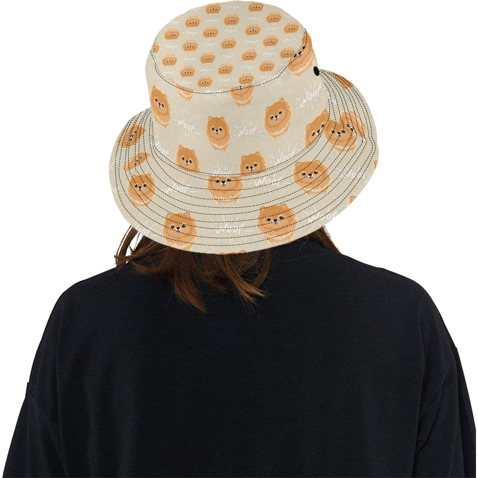 Cute brown pomeranian puppy on blue Unisex Bucket Hat