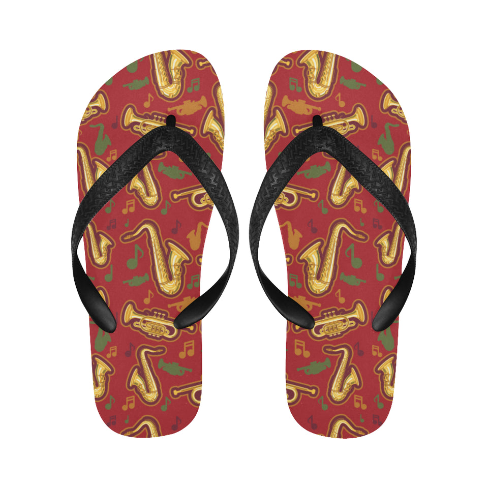 Saxophone cornet pattern red background Unisex Flip Flops