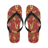 Saxophone cornet pattern red background Unisex Flip Flops