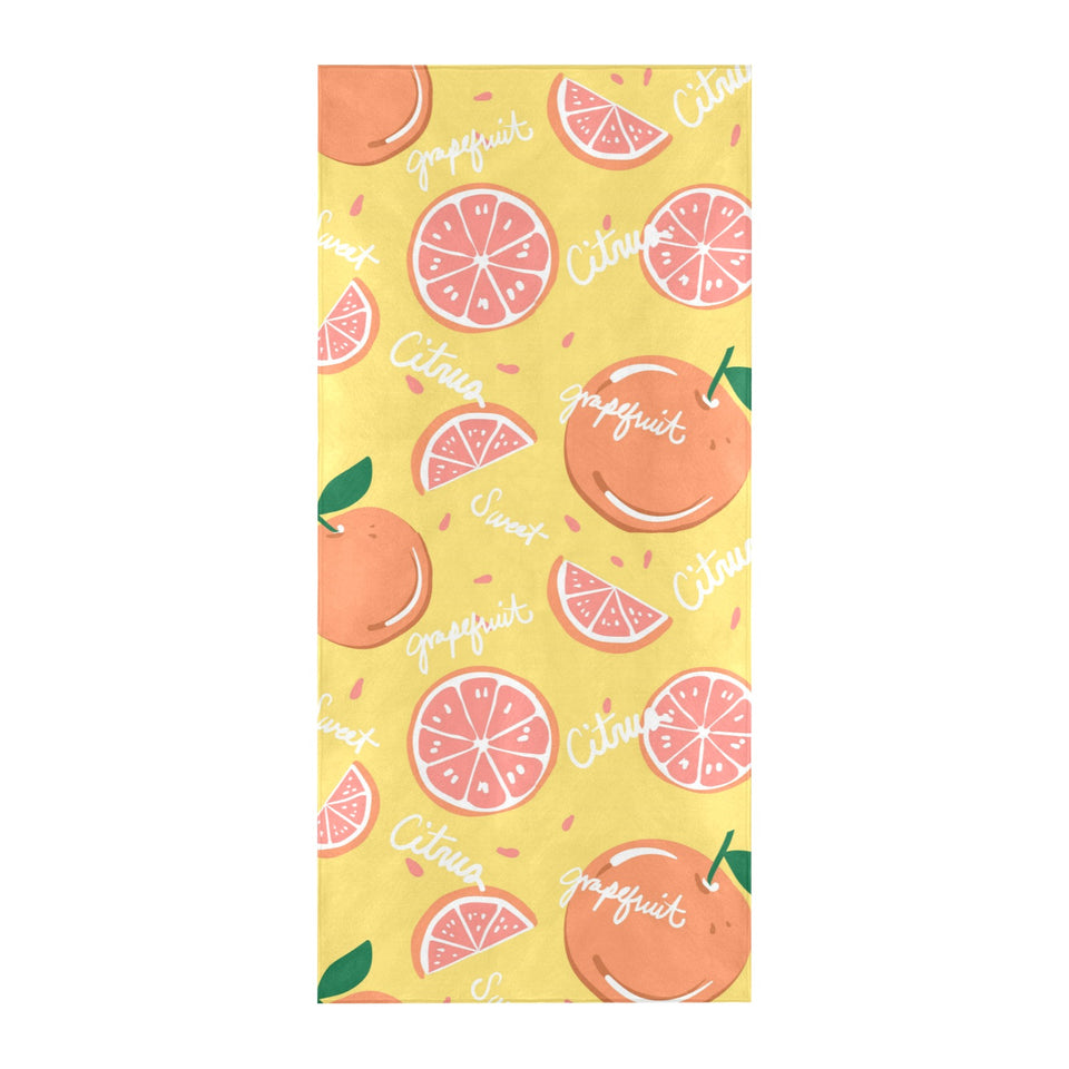 Grapefruit yellow background Beach Towel