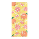 Grapefruit yellow background Beach Towel
