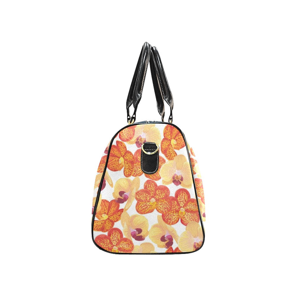 Orange yellow orchid flower pattern background Travel Bag