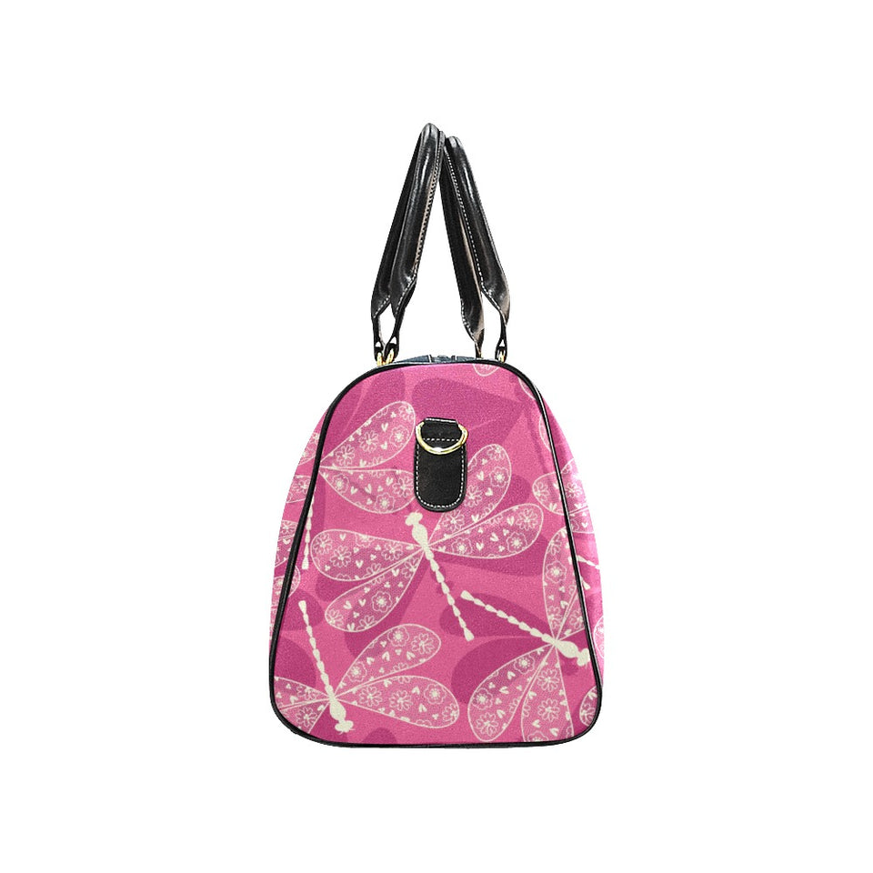 Beautiful dragonfly pink background Travel Bag