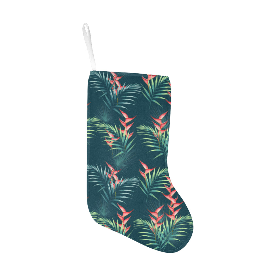 heliconia flowers, palm and monstera leaves on bla Christmas Stocking
