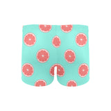 Grapefruit green background Men's Swimming Trunks