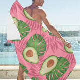 Avocado slices leaves pink back ground Beach Towel