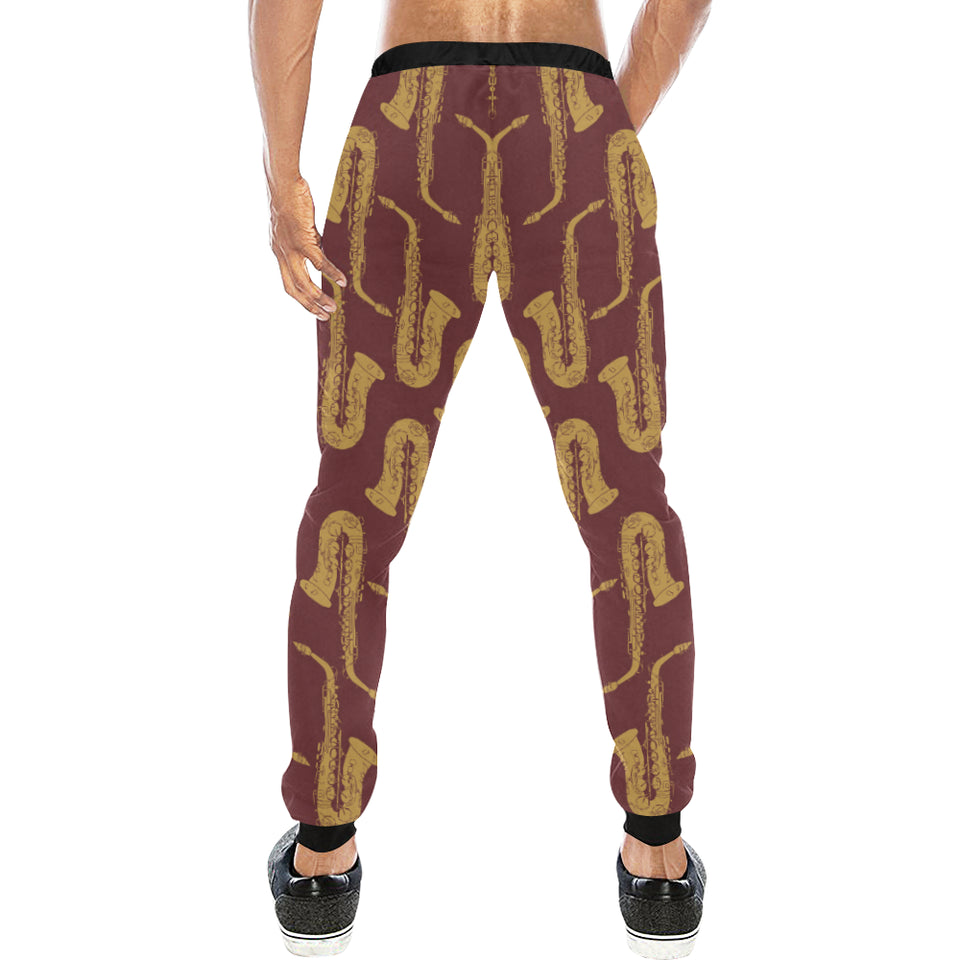 Hand drawn gold saxophone red background Unisex Casual Sweatpants