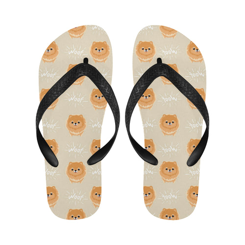 Cute brown pomeranian puppy on blue Unisex Flip Flops
