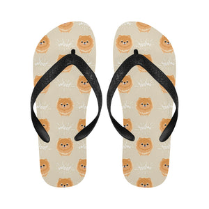 Cute brown pomeranian puppy on blue Unisex Flip Flops