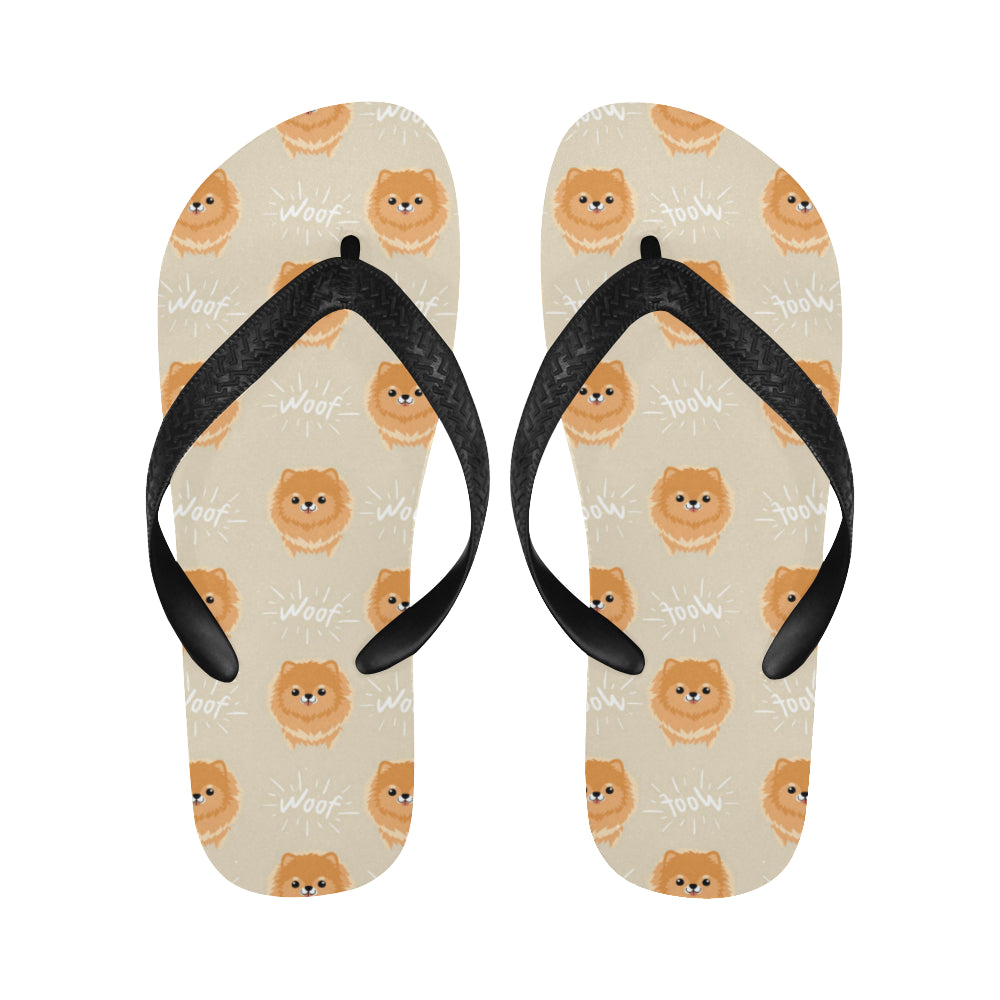 Cute brown pomeranian puppy on blue Unisex Flip Flops