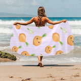 cute onions smiling faces purple background Beach Towel