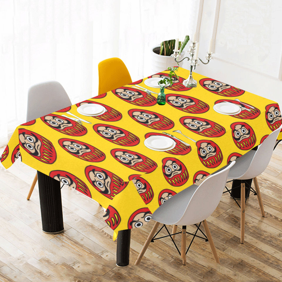Daruma japanese wooden doll yellow background Tablecloth