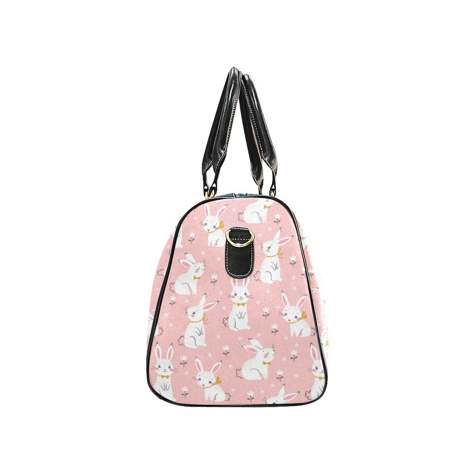 Cute white rabbit flower pink background Travel Bag