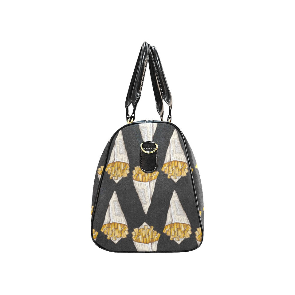 French fries dark background Travel Bag