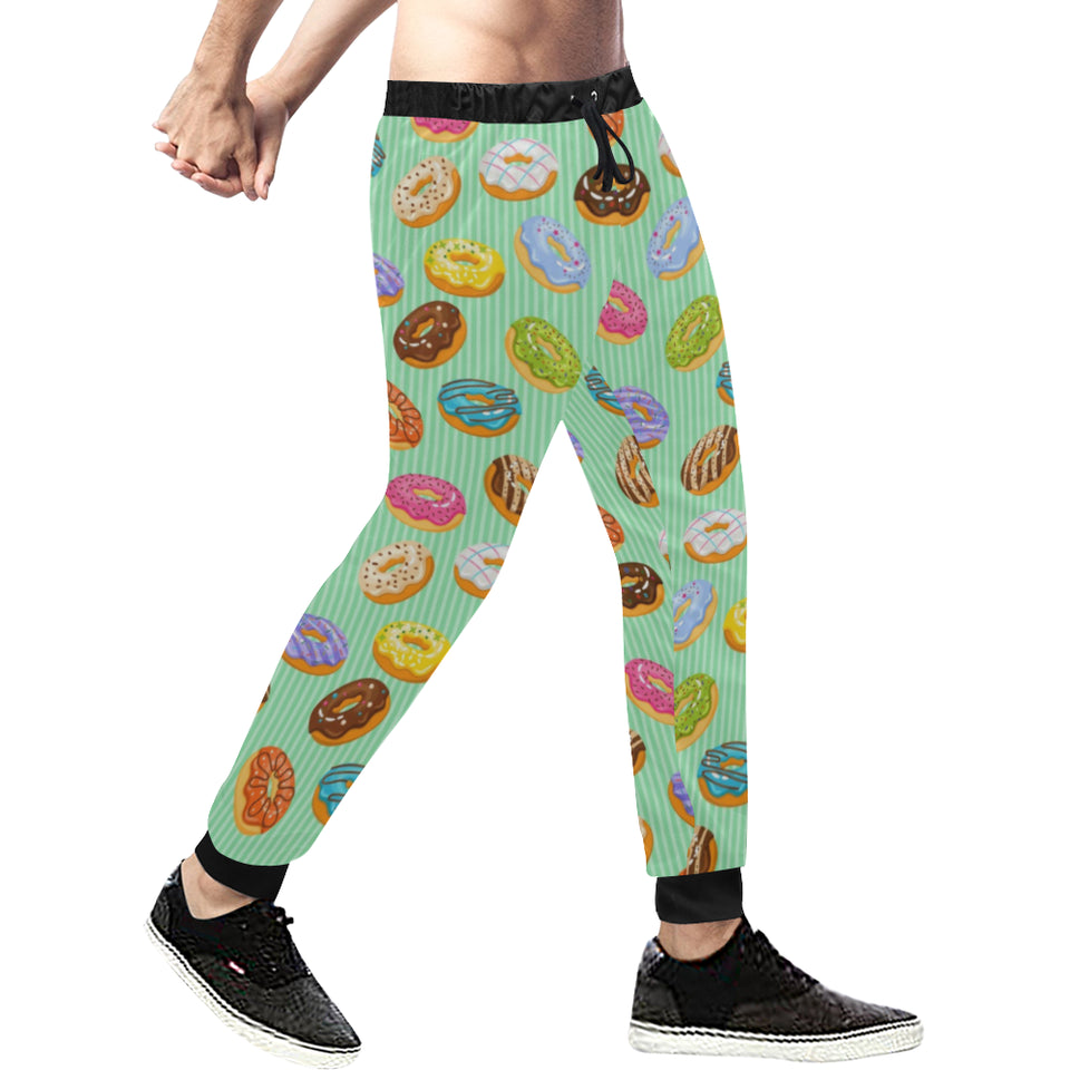 Colorful donut pattern green background Unisex Casual Sweatpants
