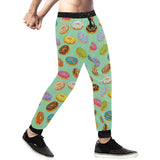 Colorful donut pattern green background Unisex Casual Sweatpants