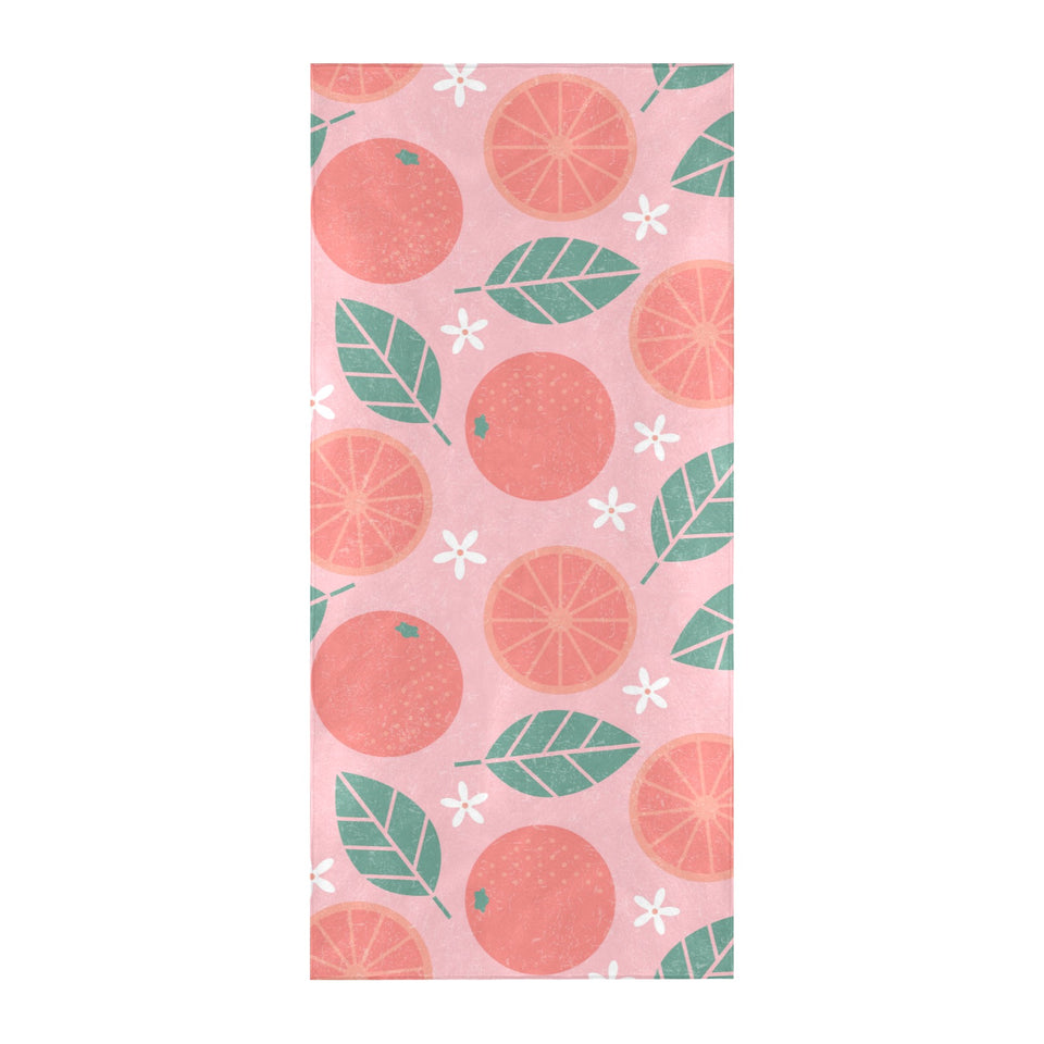 Grapefruit leaves flower pink background Beach Towel