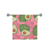 Avocado slices leaves pink back ground Bath Towel