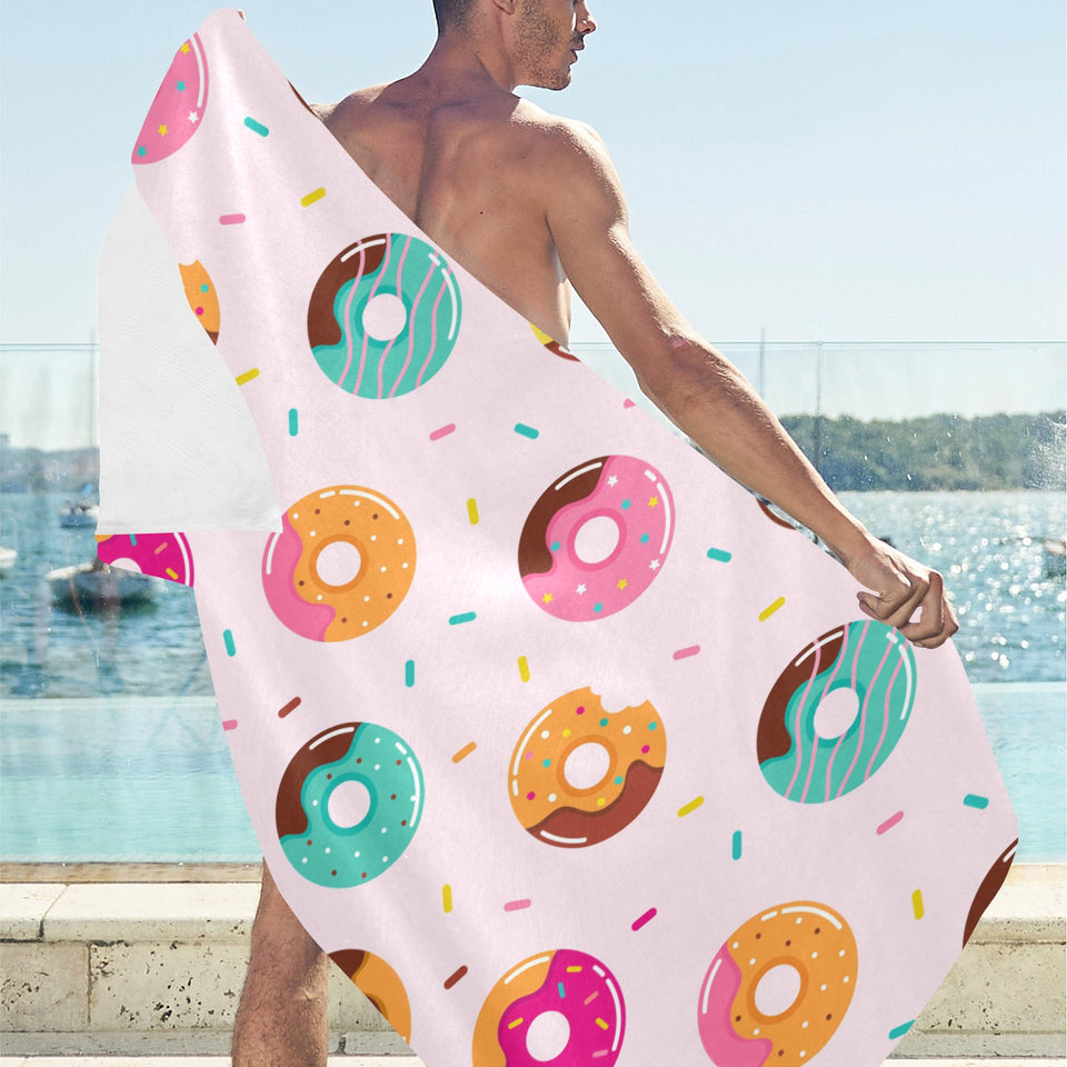 Donut pattern glaze pink background Beach Towel