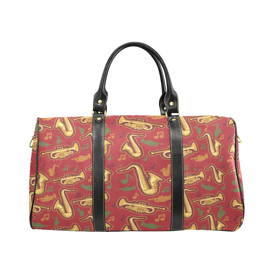 Saxophone cornet pattern red background Travel Bag