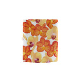 Orange yellow orchid flower pattern background Morphing Mug Heat Changing Mug