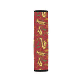 Saxophone cornet pattern red background Car Seat Belt Cover