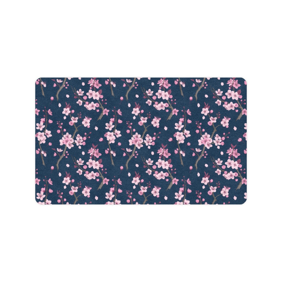 Pink sakura cherry blossom blue background Doormat