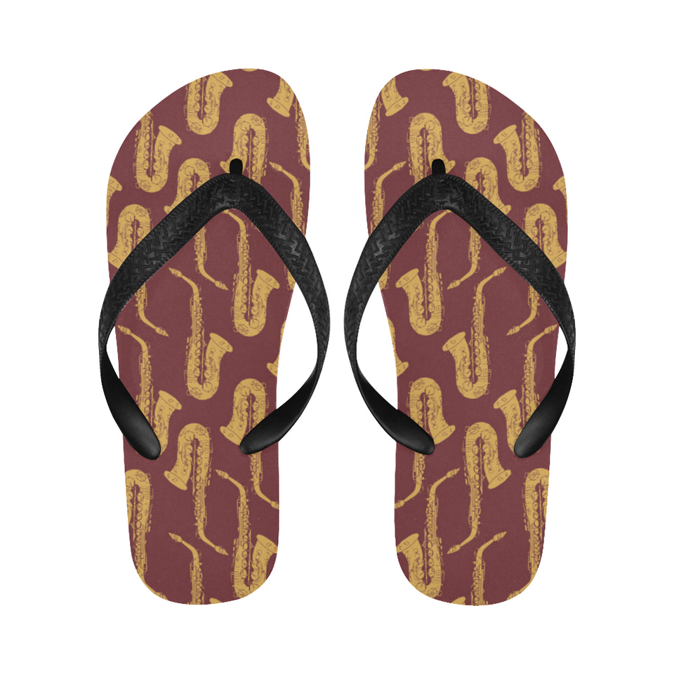 Hand drawn gold saxophone red background Unisex Flip Flops