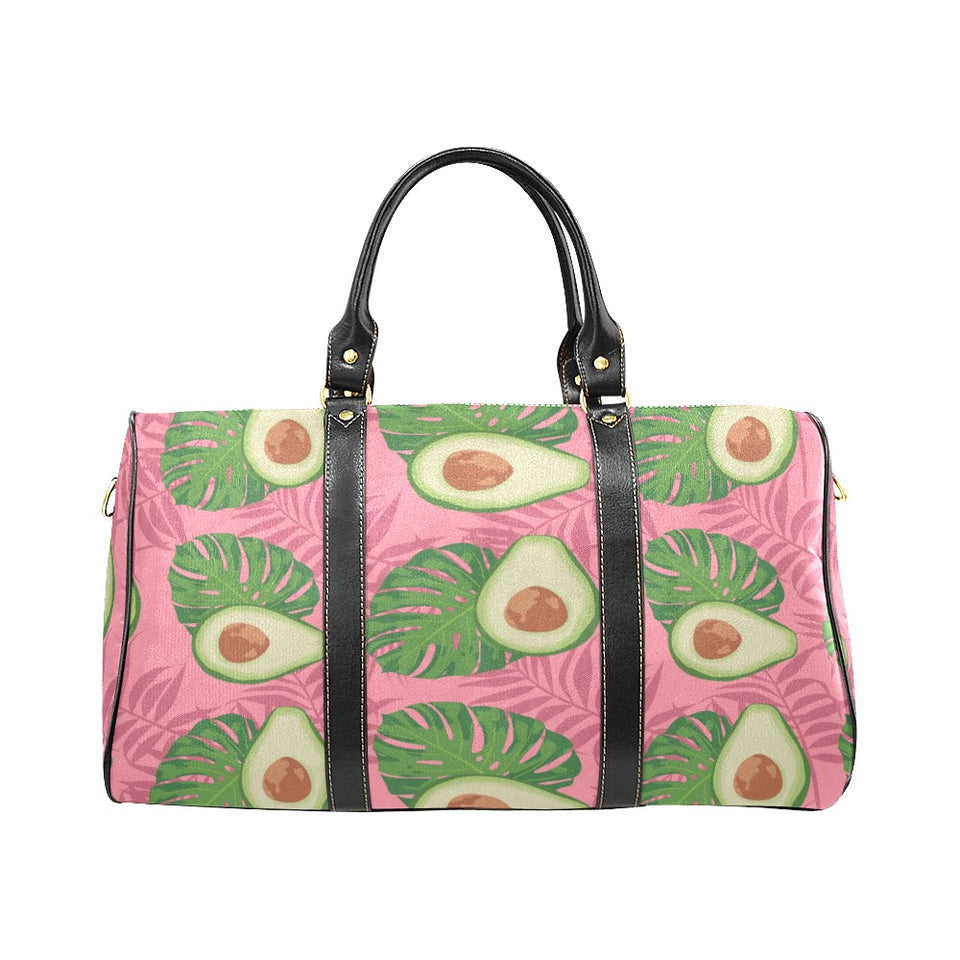 Avocado slices leaves pink back ground Travel Bag
