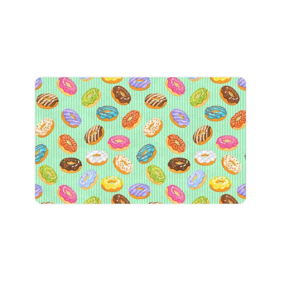 Colorful donut pattern green background Doormat
