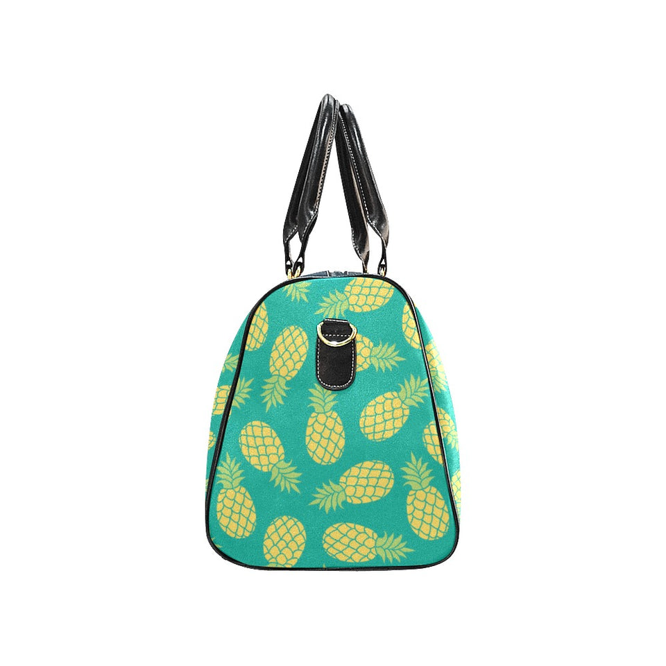 Pineapples pattern green background Travel Bag