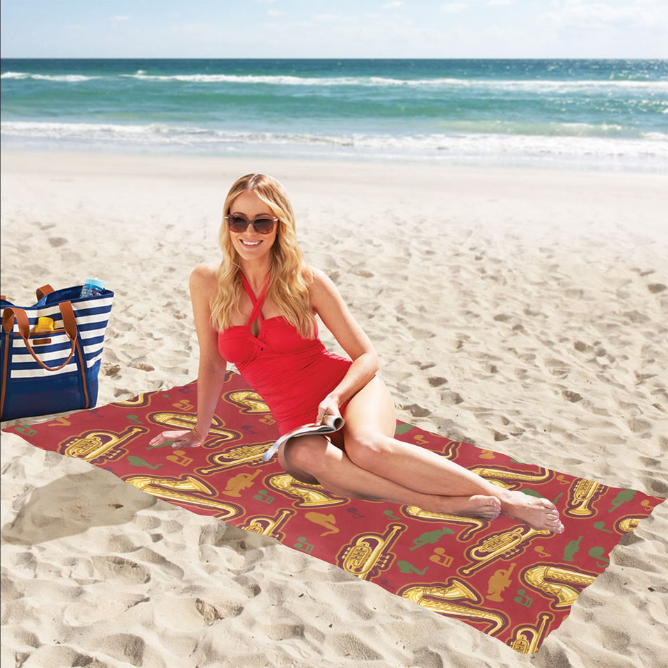 Saxophone cornet pattern red background Beach Towel