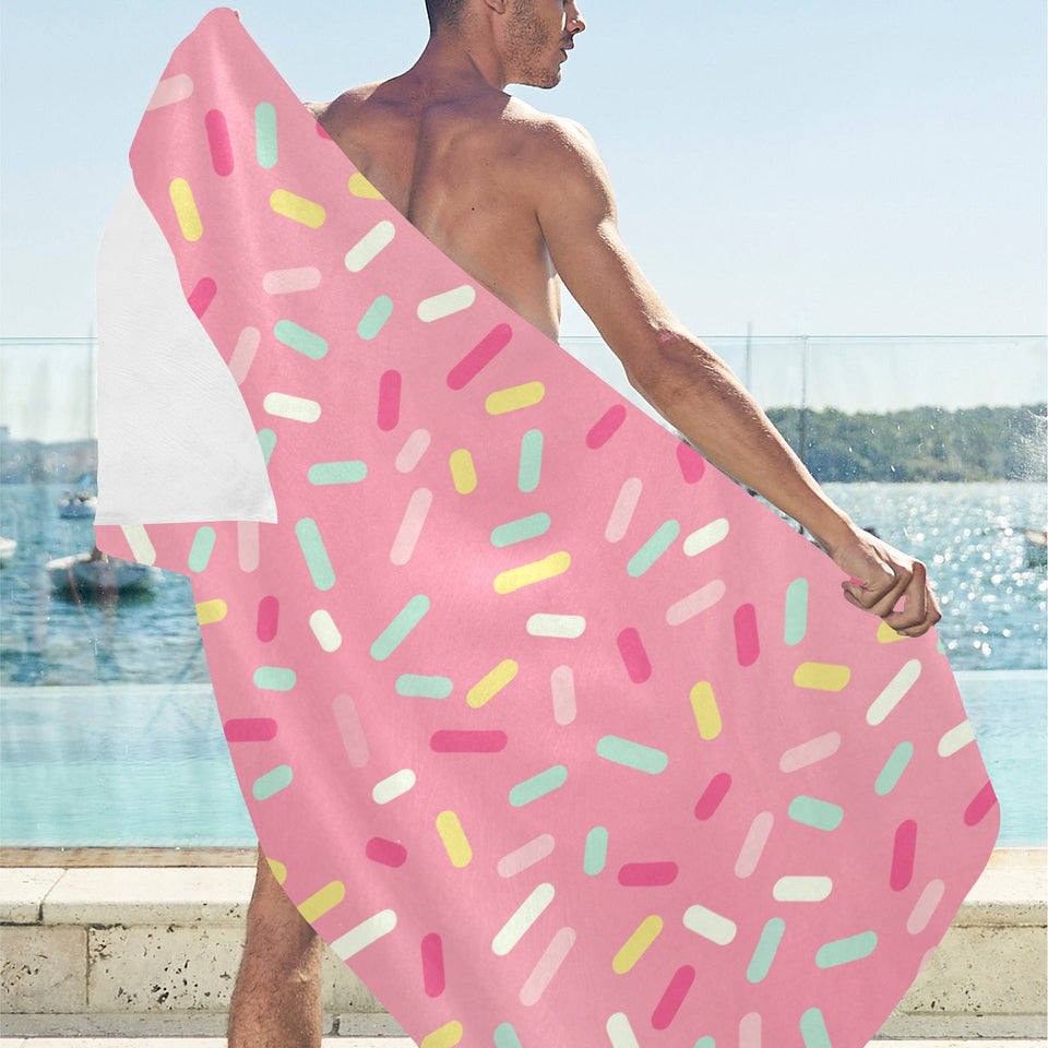 Pink donut glaze candy pattern Beach Towel