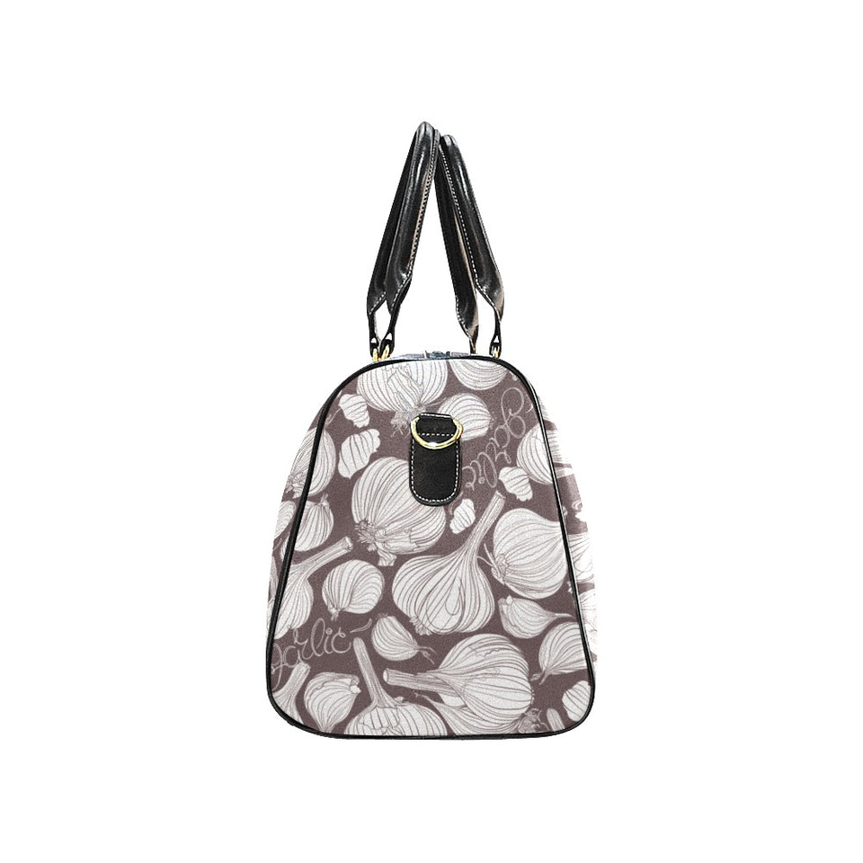 Garlic bulb dark background Travel Bag