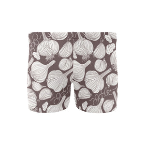 Garlic bulb dark background Men's Swimming Trunks