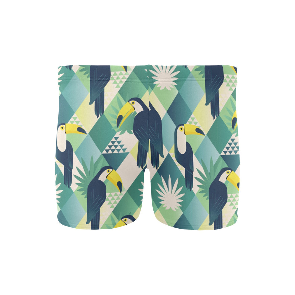 Toucan tropical leaves design pattern Men's Swimming Trunks