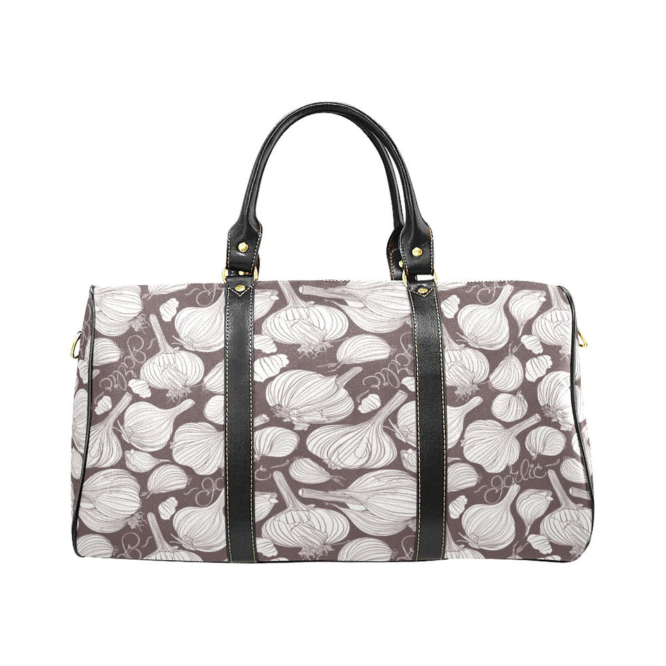 Garlic bulb dark background Travel Bag