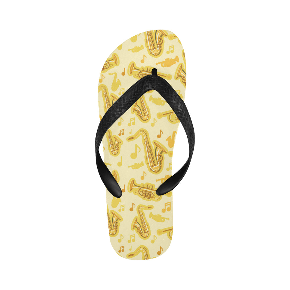 Saxophone cornet pattern yellow background Unisex Flip Flops