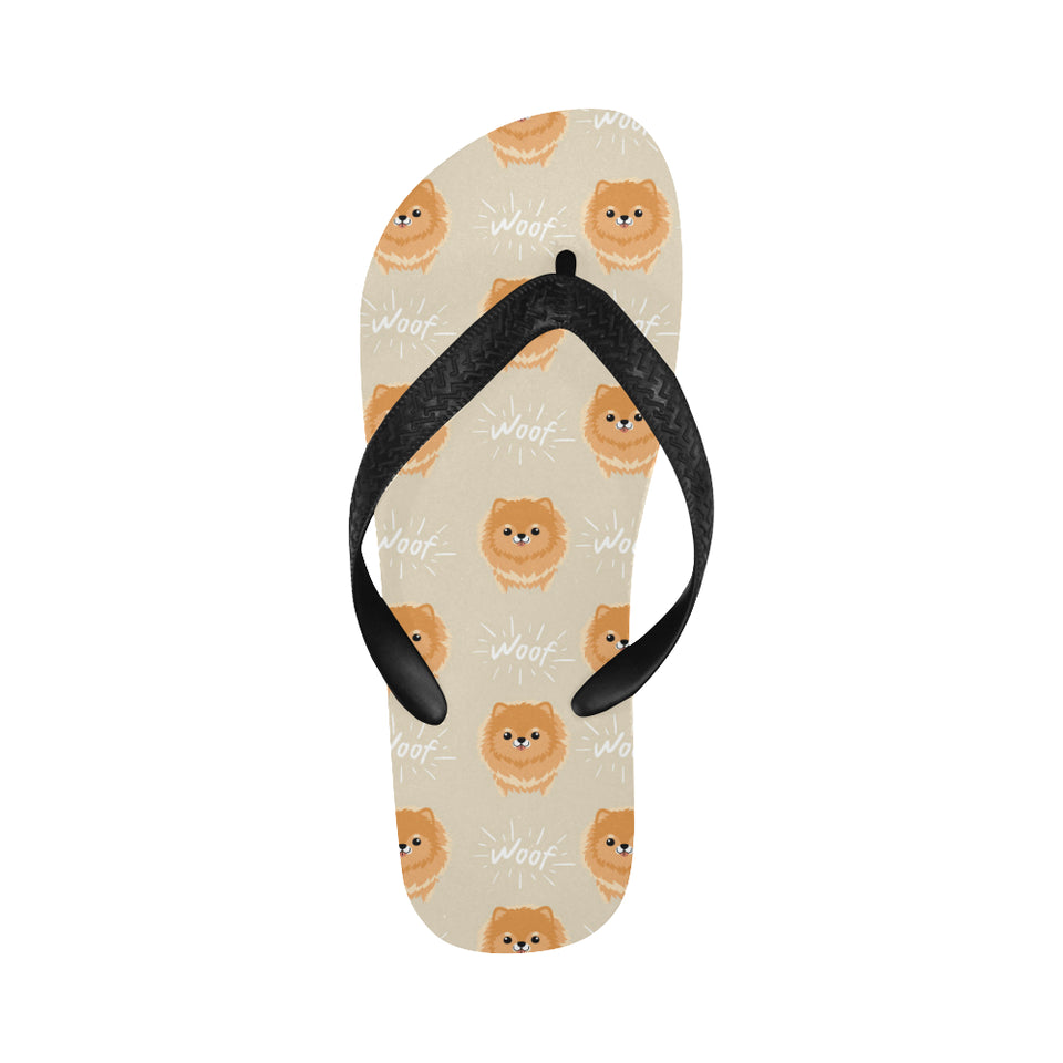 Cute brown pomeranian puppy on blue Unisex Flip Flops