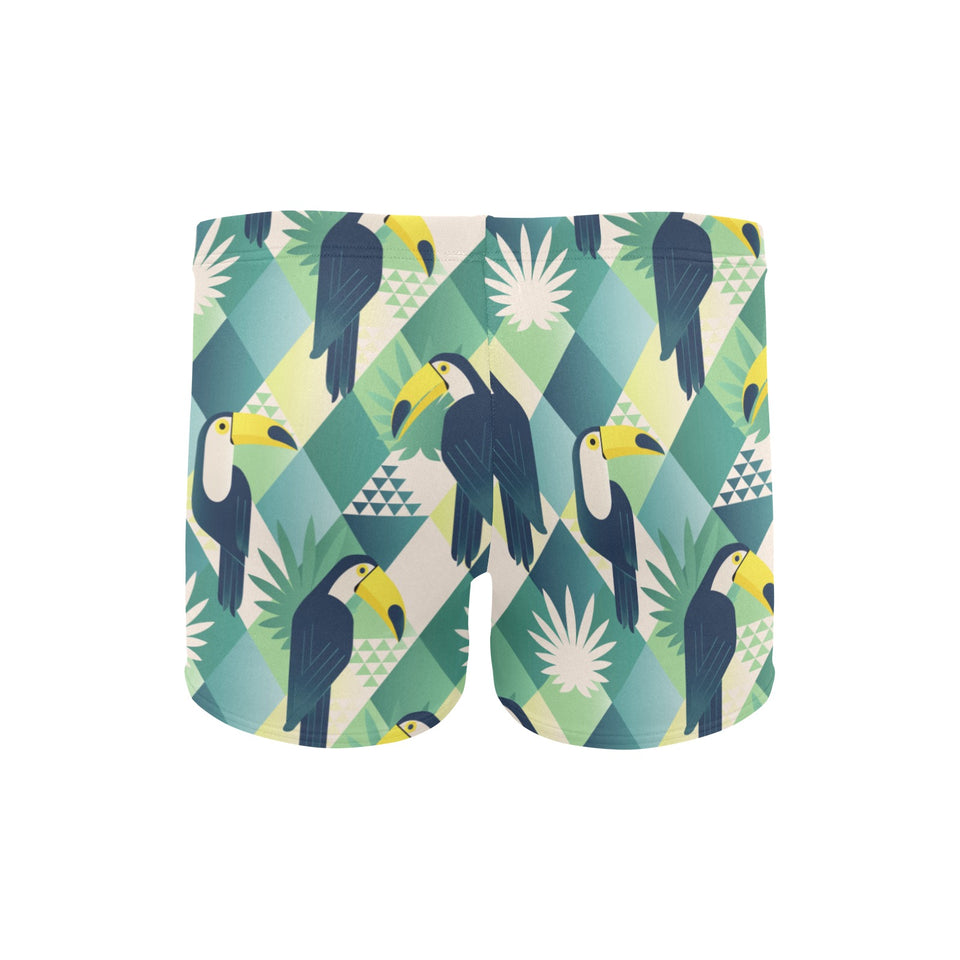 Toucan tropical leaves design pattern Men's Swimming Trunks