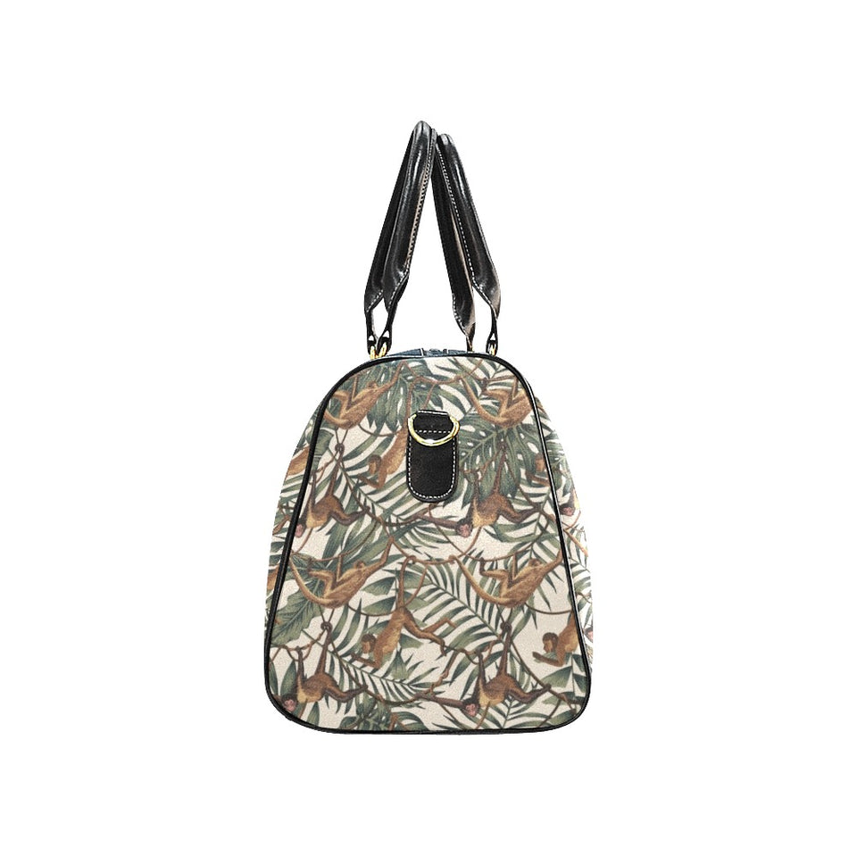 Monkey tropical leaves background Travel Bag