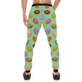 Colorful donut pattern green background Unisex Casual Sweatpants