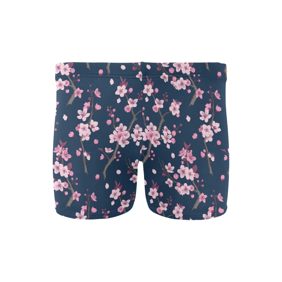 Pink sakura cherry blossom blue background Men's Swimming Trunks