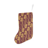 Hand drawn gold saxophone red background Christmas Stocking