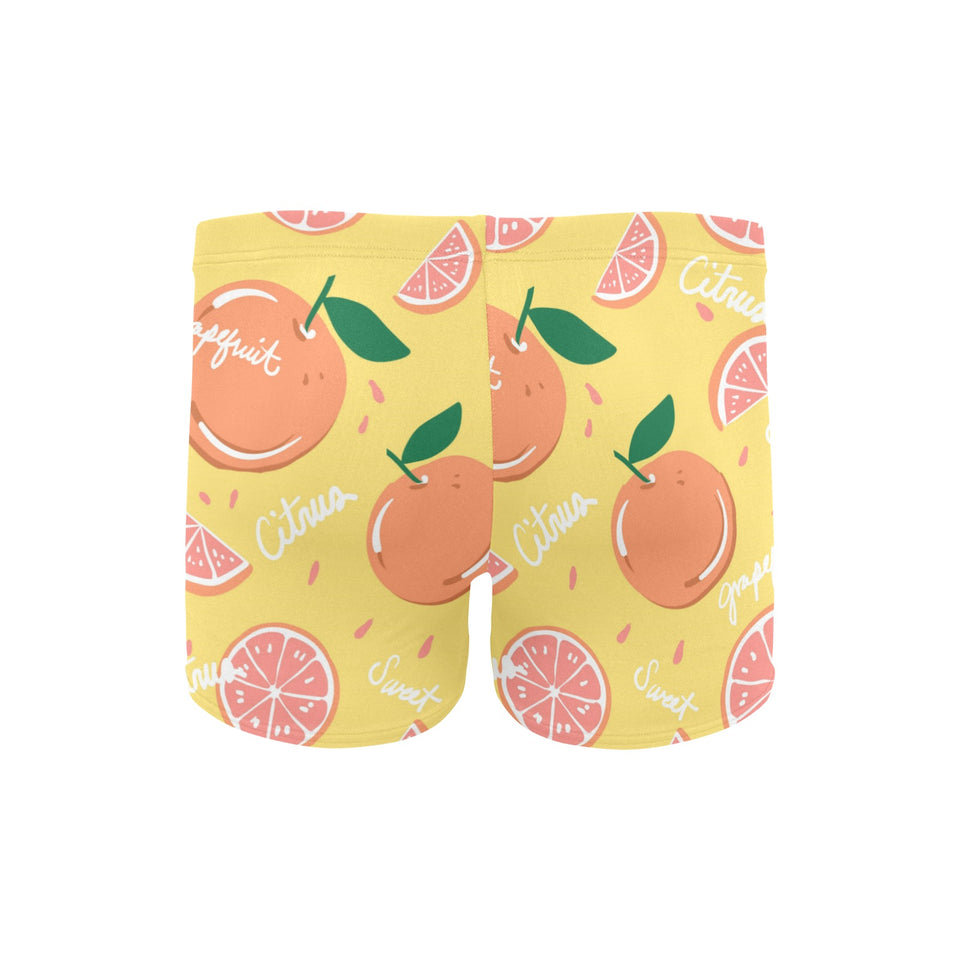 Grapefruit yellow background Men's Swimming Trunks